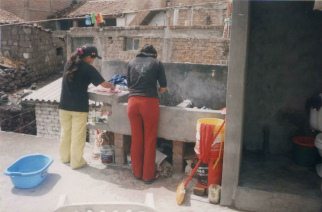 Washing clothes on the roof,
Pamela and Shirley 01 Washing clothes on the roof, Pamela and
Shirley 01