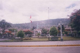Plaza de Armas, preparation for the
                        military parade for a Peruvian flag 04, the
                        flags are waving
