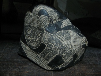 Wise man or native with a leaf in his
                            hands