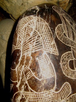 And besides of the snake there is a bird
                          god, here the arm and the neck