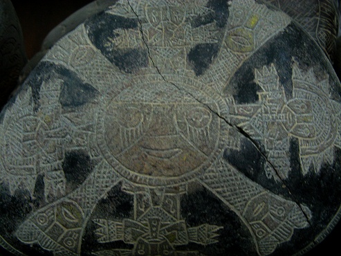 And here follows another stone of the
                          sun, this time with sun gods around the sun