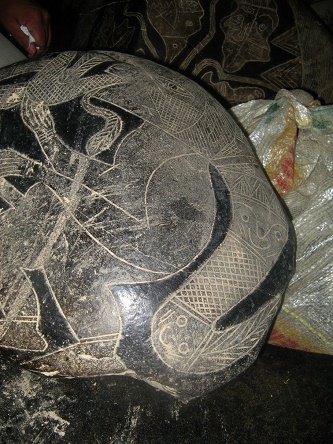 The hair of the man has got faces 01