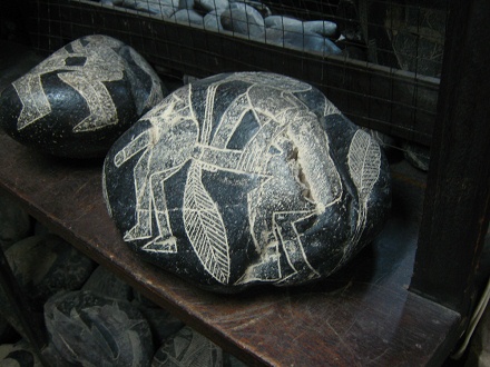 Two stones with homo sceneries