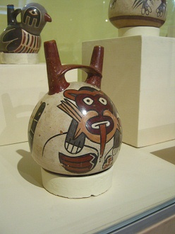 Ceramic bottle with the design
                                    of a monkey