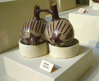 Ceramic bottle in form of crude melons