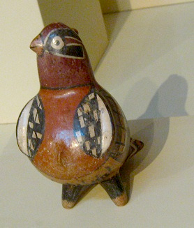Ceramic bottle of
                Nazca culture in form of a parrot