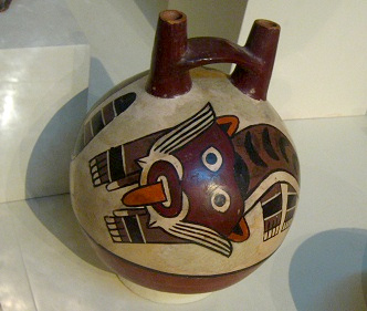 Ceramic bottle with the head of
                                    the wild cat, close-up 02