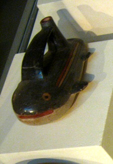 Ceramic bottle in form of a
                                    wale, frontal view