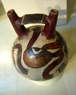 Botella
de cerámica con ojos y lenguas
pintadas 01 Botella de cerámica con ojos y
lenguas pintadas 01