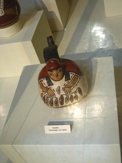 Bottle with a person with garlic