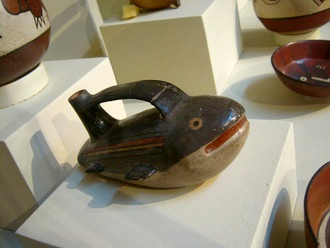 Ceramic bottle in form of a
                                    wale, close-up