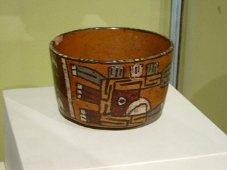 Ceramic cup of Wari culture with
                            figures of gods