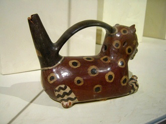 Ceramic bottle in form of a
                                    wild cat, lateral view