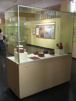 Showcase with caps of Wari culture