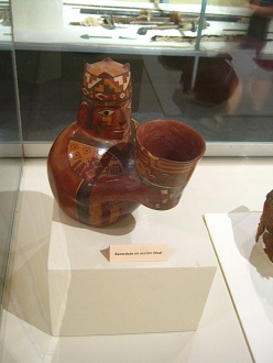 Ceramics statue with a Wari cap