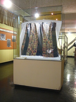 Showcase with a big tunic skirt