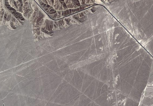Satellite
              photo of a part of the Nasca lines with the road of
              Southern Panamericana in the Nasca desert. One can see
              only direct lines and runways. Later Mrs. Maria Reiche
              also detected the figures.